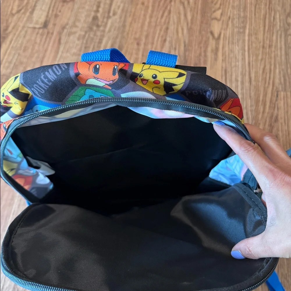 Pokémon backpack, insulated lunch bag, pencil case and key chain. New with tags.